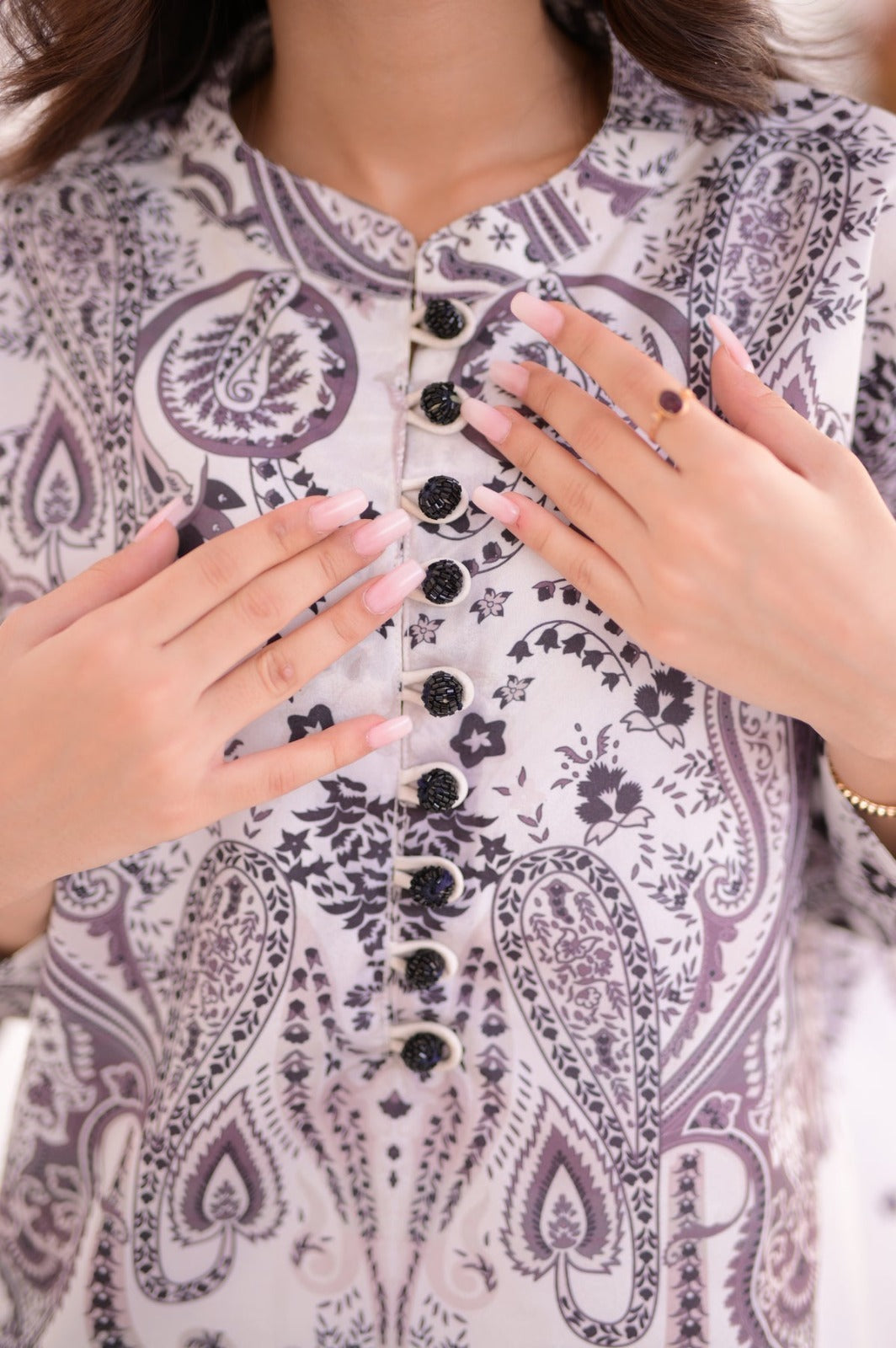 "White Shalwa Kameez With purple and black paisley printed"